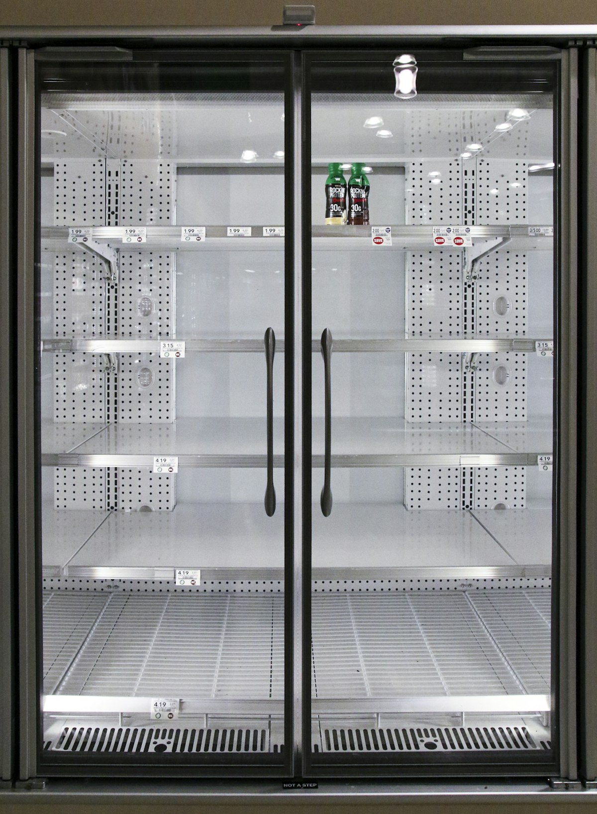 Well-organized refrigerator with properly stored fresh food
